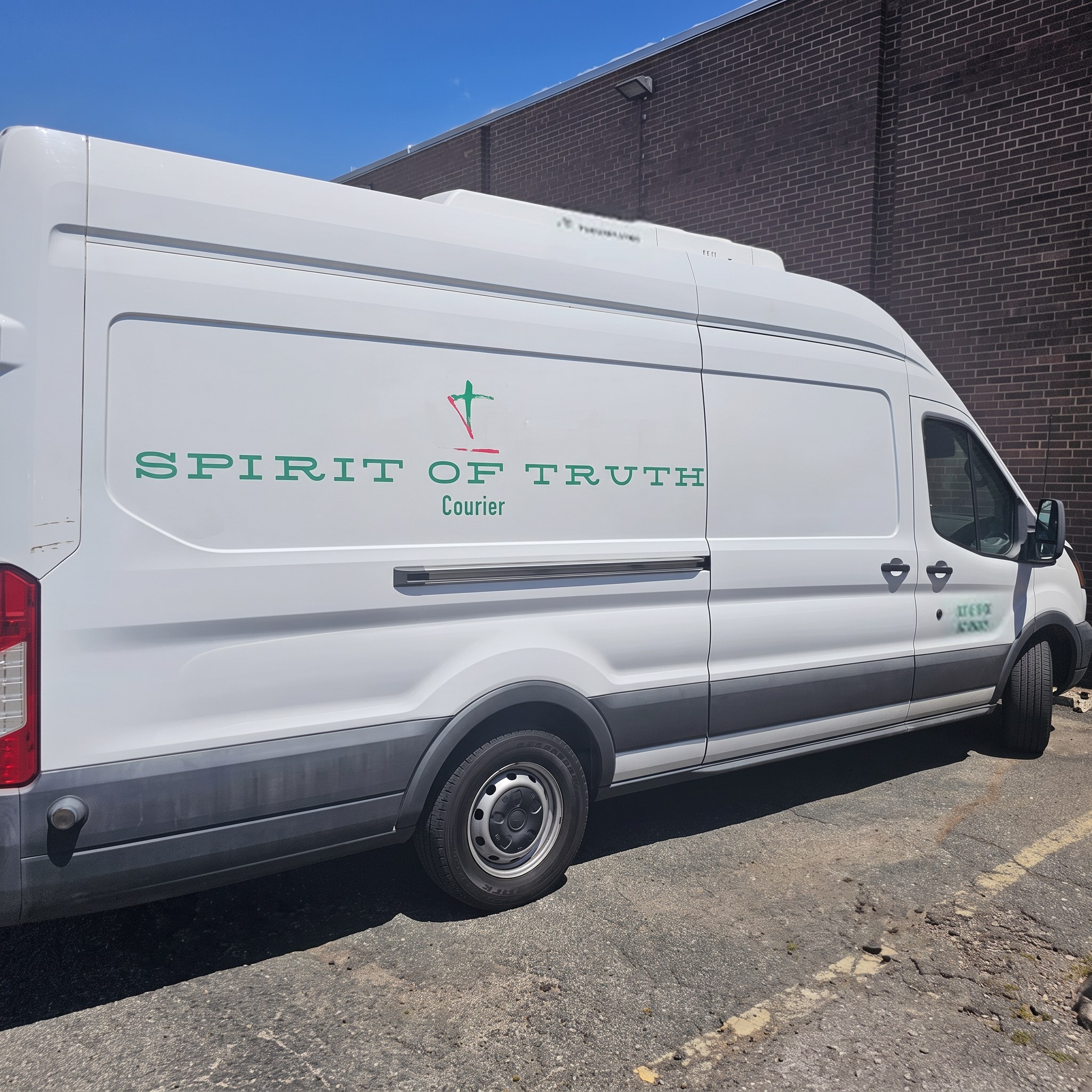 Spirit of Truth Courier branded refrigerated cargo van